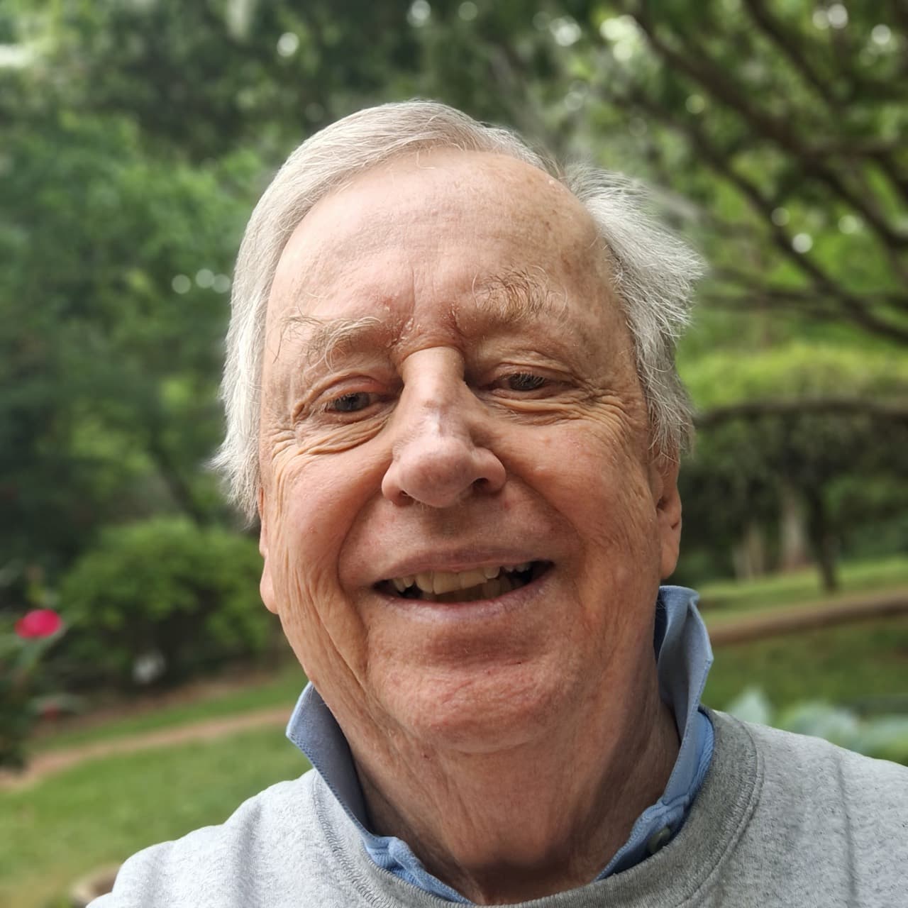 Joe Belden smiling outdoors